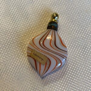 Tiny antique lay down perfume bottle